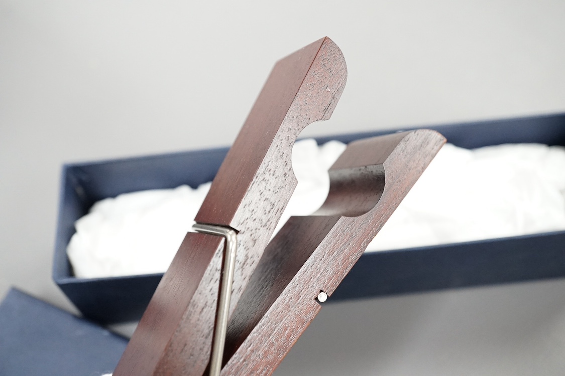 A cased David Linley letter clip in the form of a clothes peg, 15cm in length. Condition - fair, minor scuffs